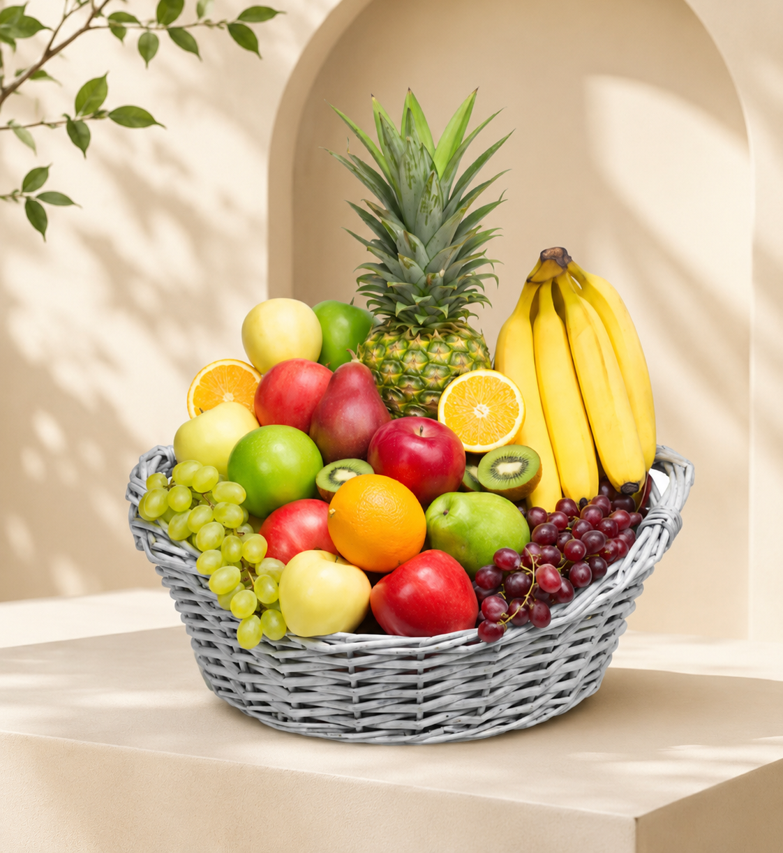 Luxury fresh fruit basket with pineapple, grapes, apples, oranges, kiwi, bananas, and pears in premium fruit basket basket