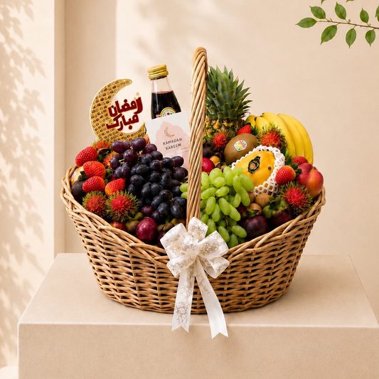 Luxury Ramadan fruit basket with grapes, strawberries, pineapple, bananas, kiwi, rambutan, and premium seasonal fruits in an elegant wicker basket, perfect for Ramadan gifting in Dubai