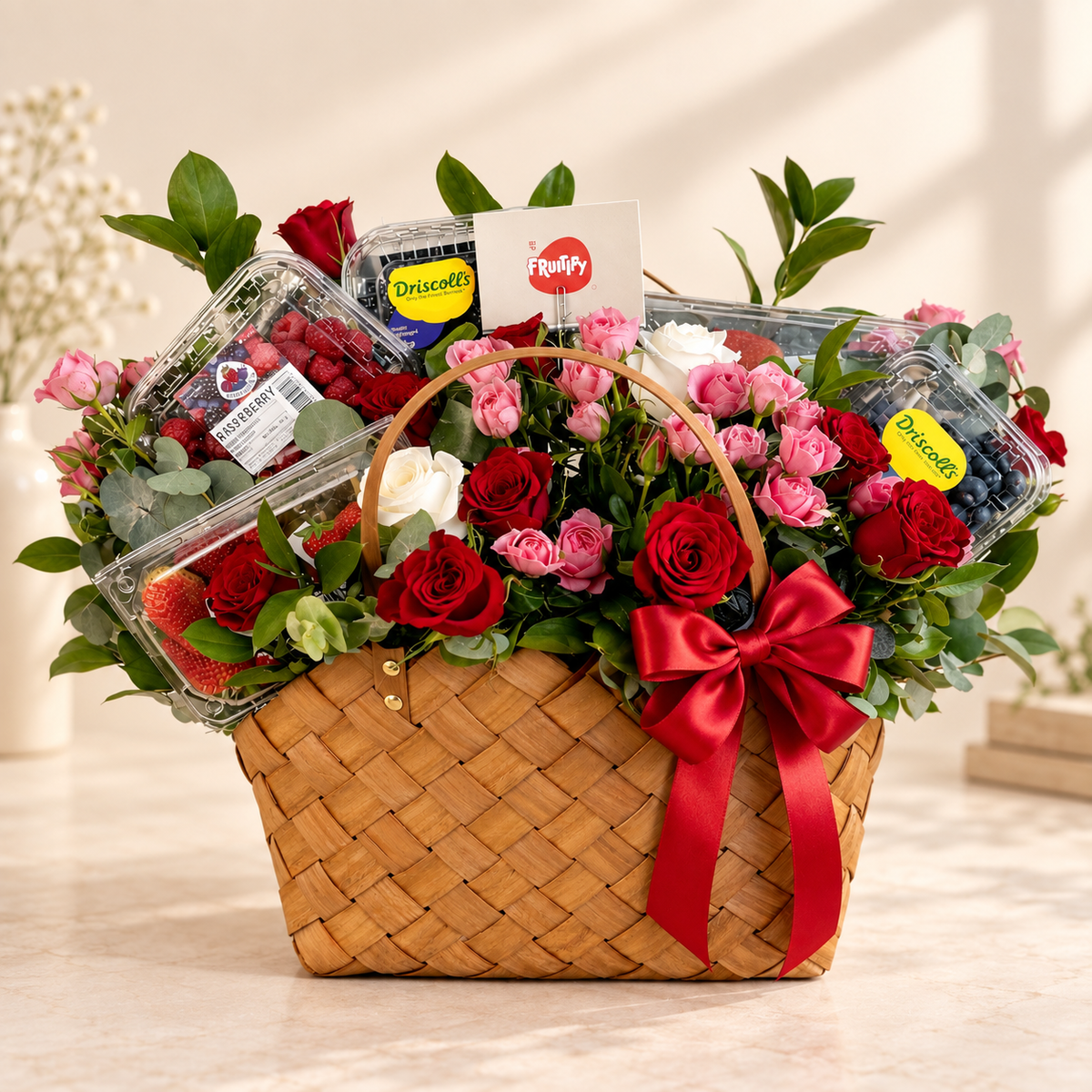 Fresh strawberry raspberry blueberry and blackberry gift with roses Dubai