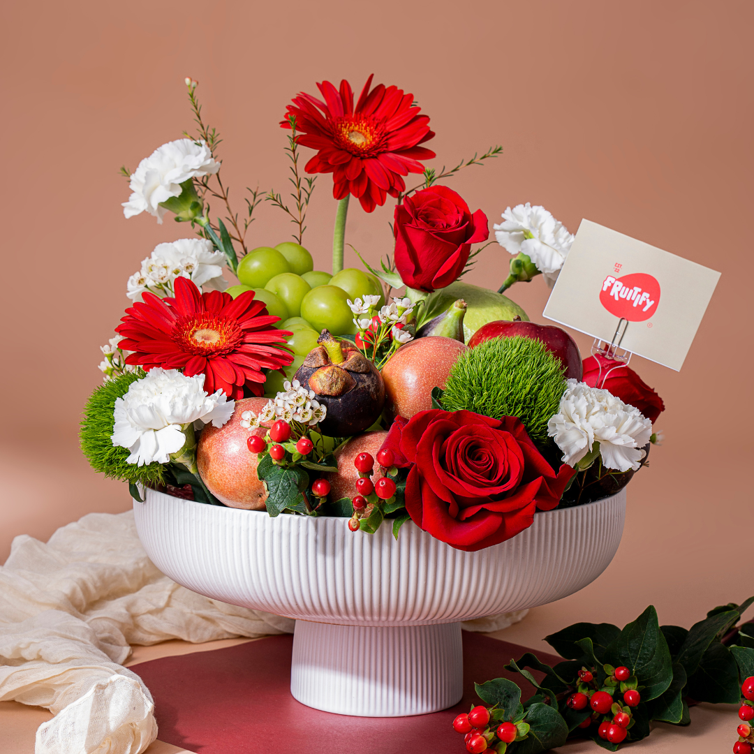 Premium exotic fruit gift arrangement with fresh fruits and flowers for same-day delivery in Dubai