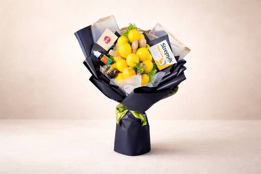 Bouquet of lemons and limes with Shepherd's labels on a beige background