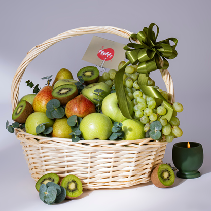 Premium green fruit basket featuring green apples, pears, kiwi, grapes, and seasonal fruits in an elegant wicker basket, perfect for healthy gifting and same-day delivery in Dubai